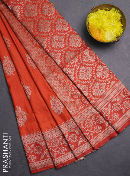 Semi soft silk saree rust shade with zari woven buttas and zari woven border