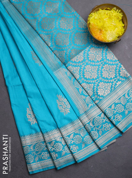 Semi soft silk saree teal blue with zari woven buttas and zari woven border