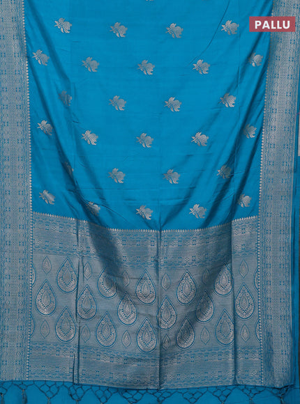 Semi soft silk saree teal blue with zari woven buttas and zari woven border