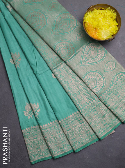 Semi soft silk saree pastel green with zari woven buttas and zari woven border
