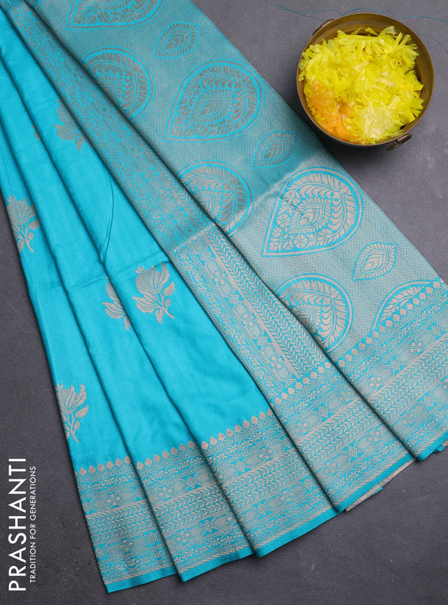 Semi soft silk saree teal green with zari woven buttas and zari woven border
