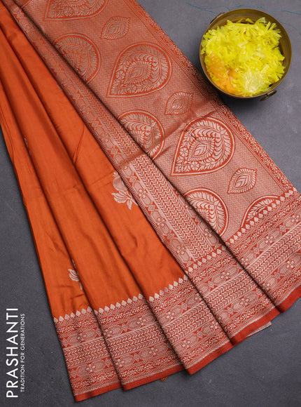 Semi soft silk saree rust shade with zari woven buttas and zari woven border