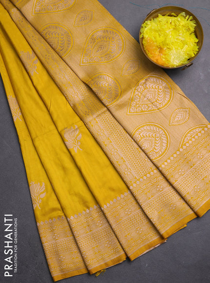 Semi soft silk saree mustard yellow with zari woven buttas and zari woven border