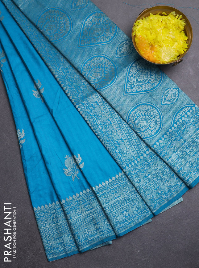 Semi soft silk saree teal blue shade with zari woven buttas and zari woven border