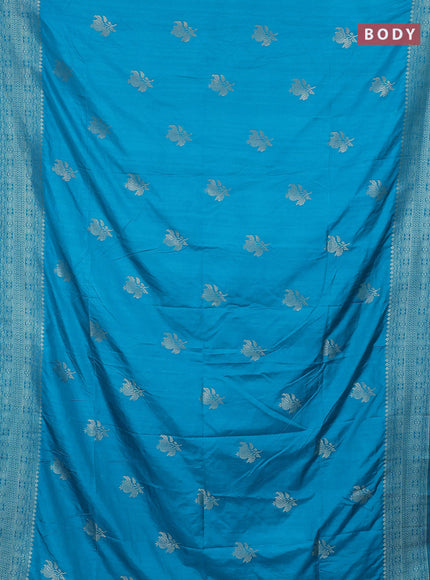 Semi soft silk saree teal blue shade with zari woven buttas and zari woven border