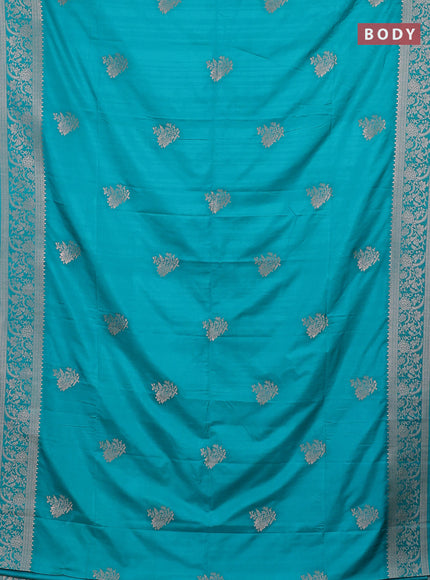 Semi soft silk saree teal green with zari woven buttas and zari woven border
