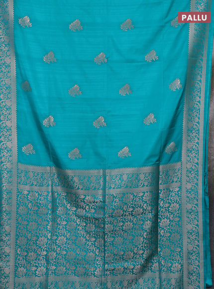Semi soft silk saree teal green with zari woven buttas and zari woven border