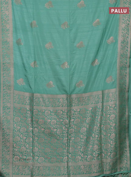 Semi soft silk saree pastel green with zari woven buttas and zari woven border