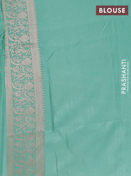 Semi soft silk saree pastel green with zari woven buttas and zari woven border