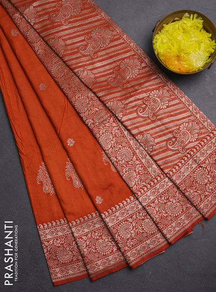 Semi soft silk saree rust shade with zari woven buttas and zari woven border