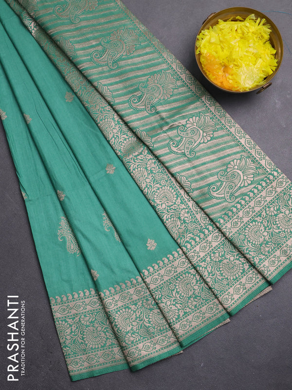 Semi soft silk saree pastel green with zari woven buttas and zari woven border