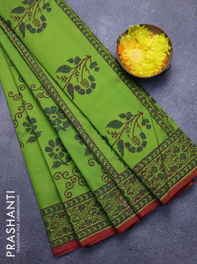 Silk cotton block printed saree light green and maroon shade with floral prints and printed border