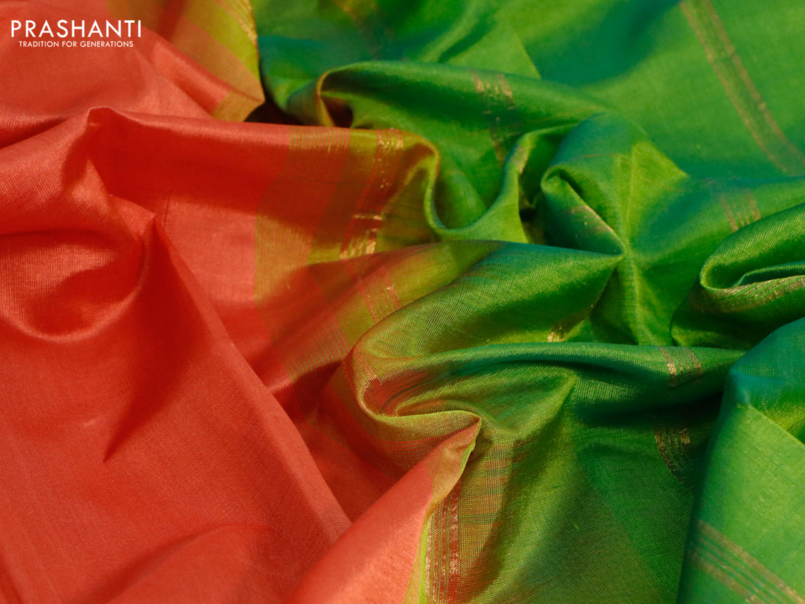 Silk cotton saree rustic orange and light green with plain body and small zari woven border