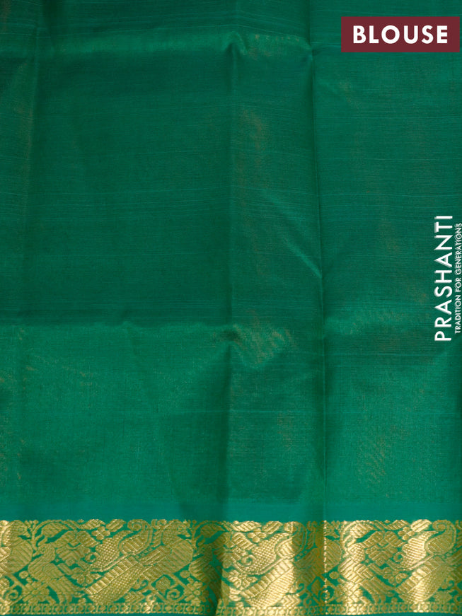 Silk cotton saree rustic orange and green with plain body and peacock zari woven border