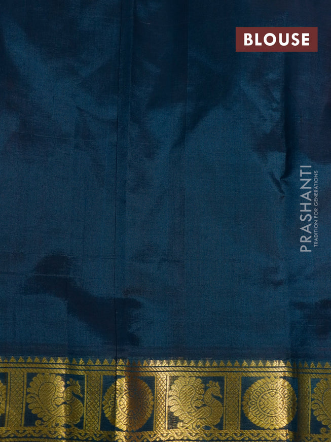 Silk cotton saree red shade and peacock blue with plain body and zari woven annam border