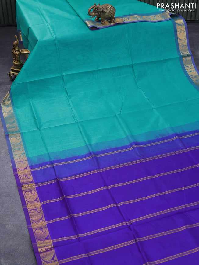 Silk cotton saree teal blue and blue with plain body and paisley zari woven border