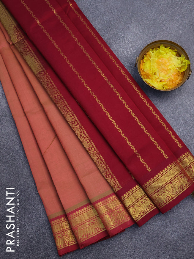 Silk cotton saree red shade and maroon with plain body and zari woven border