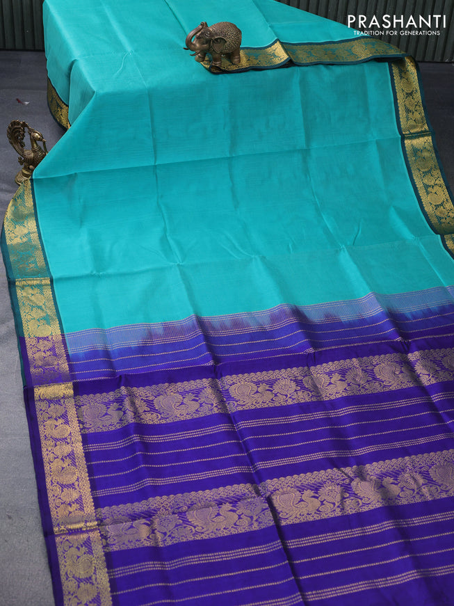 Silk cotton saree teal blue and blue with plain body and annam zari woven border