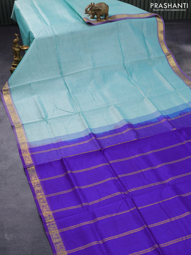 Silk cotton saree teal blue and blue with plain body and zari woven border