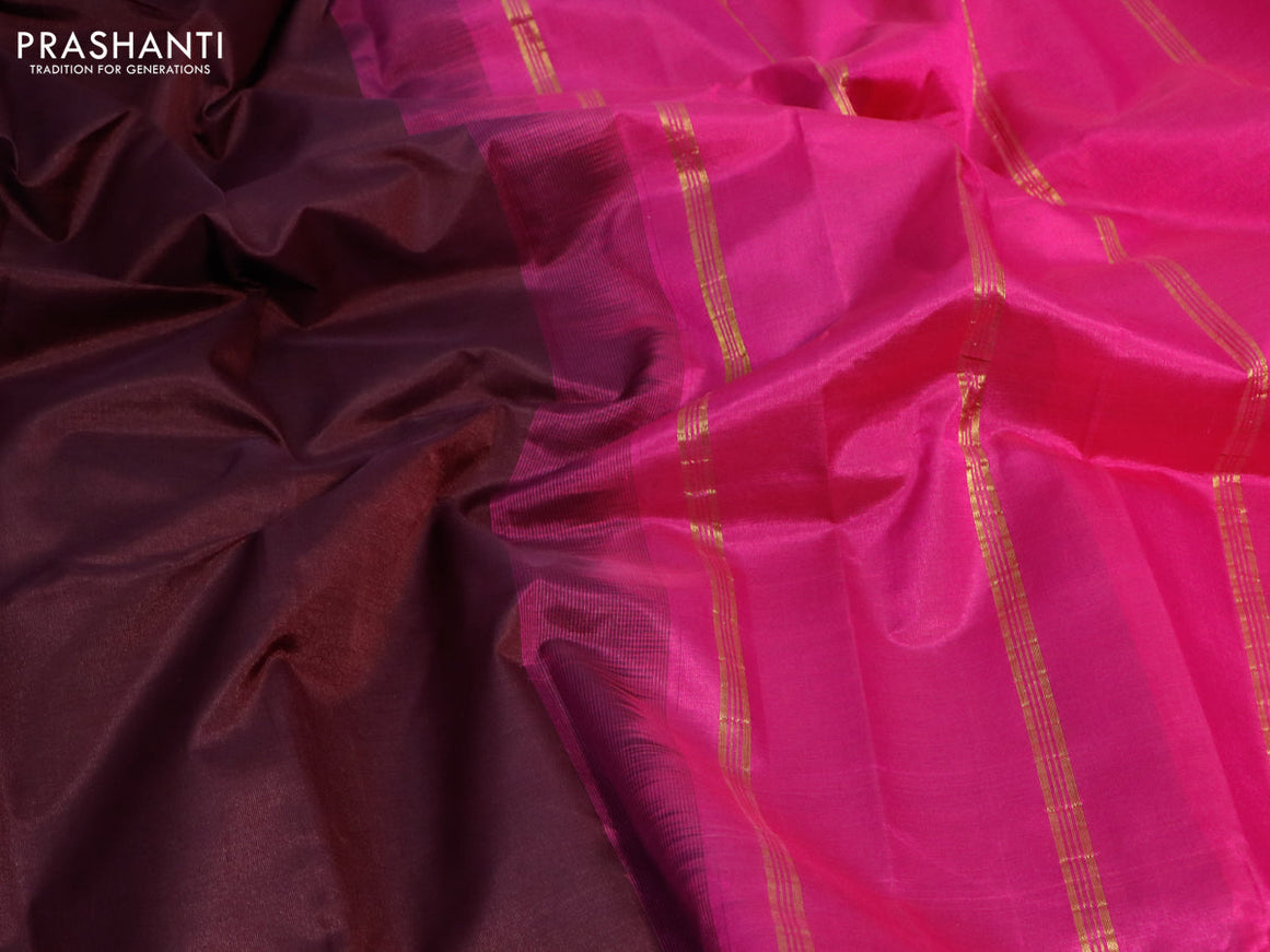 Silk cotton saree brown and magenta pink with plain body and annam & paisley zari woven border
