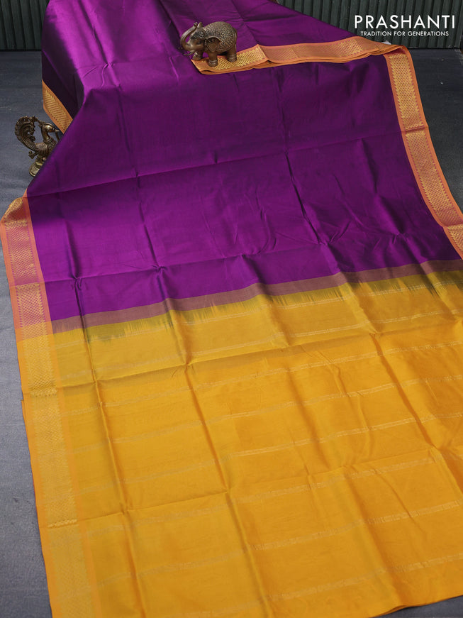Silk cotton saree purple and mustard yellow with plain body and zari woven border