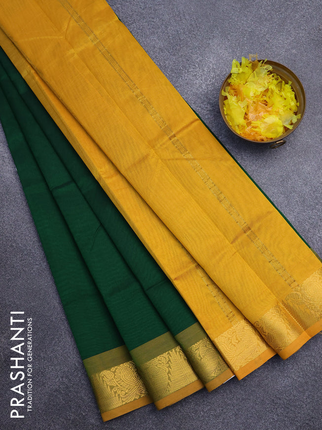 Silk cotton saree green and mustard yellow with plain body and annam zari woven border