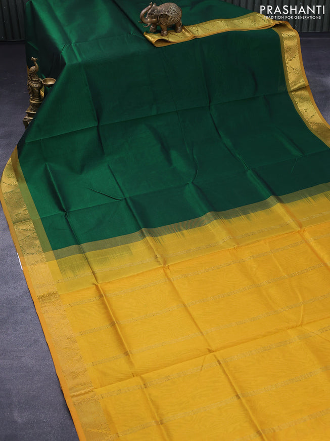 Silk cotton saree green and mustard yellow with plain body and annam zari woven border