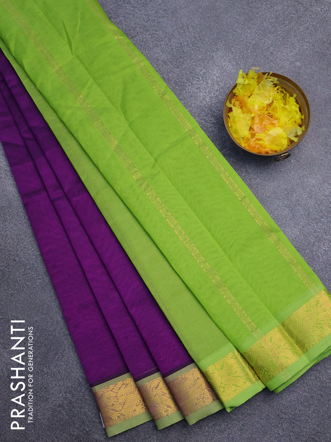 Silk cotton saree purple and light green with plain body and peacock zari woven border