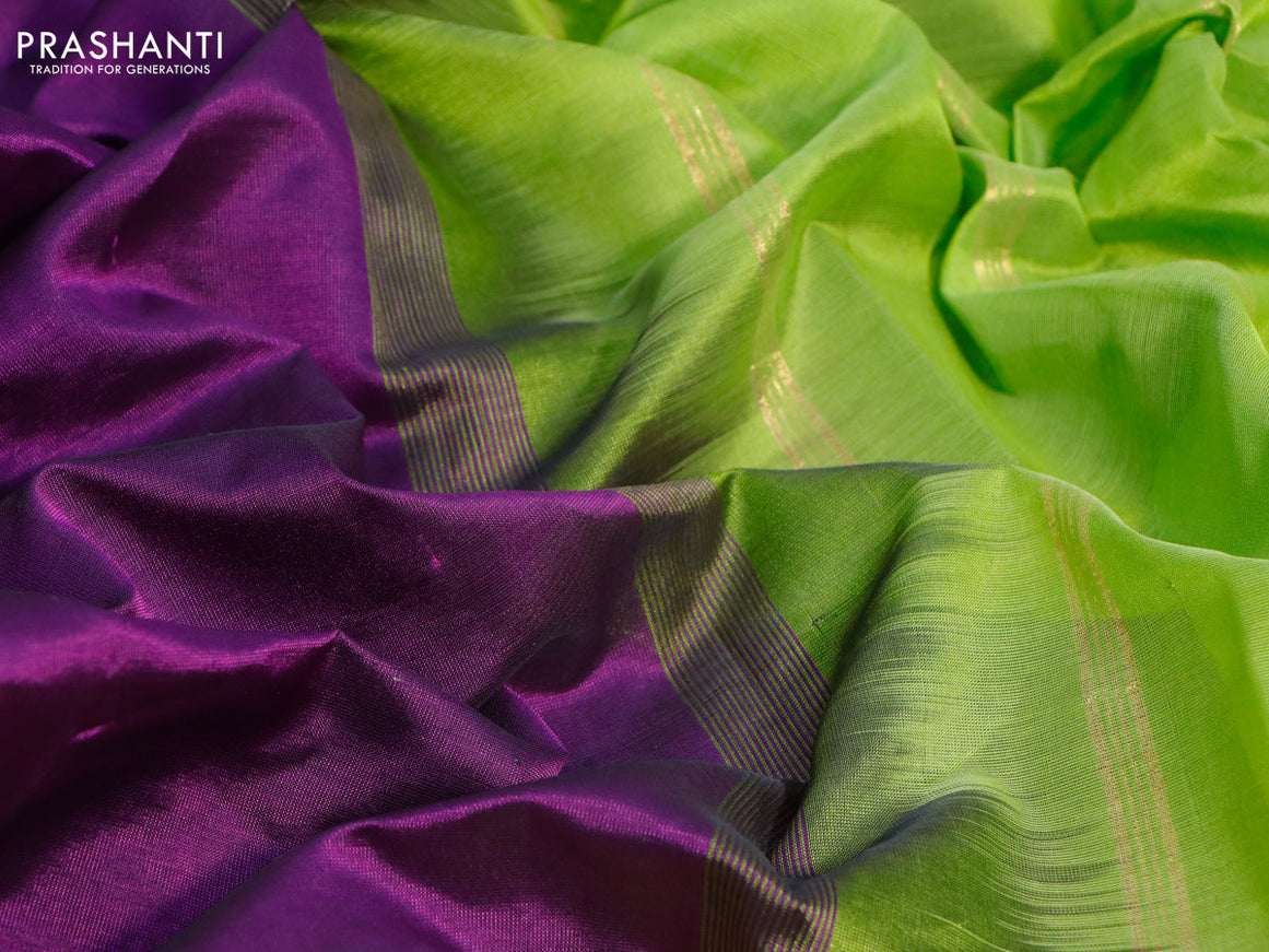Silk cotton saree purple and light green with plain body and peacock zari woven border