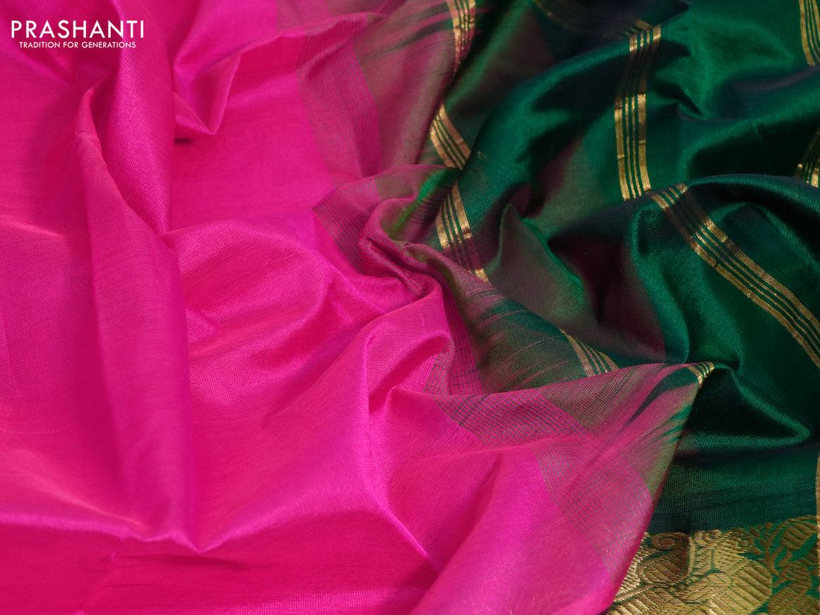 Silk cotton saree pink and green with plain body and peacock zari woven border