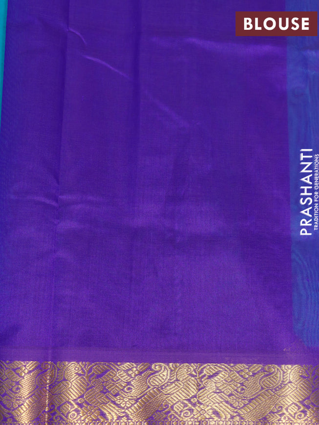 Silk cotton saree teal blue and blue with plain body and peacock zari woven border