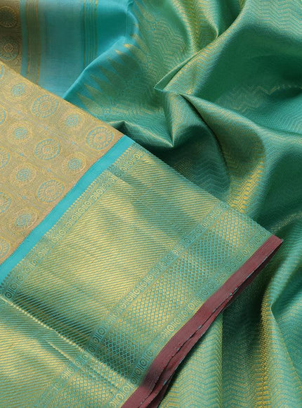 Pure kanjivaram tissue silk saree gold and teal blue with allover rudhraksha zari woven brocade weaves and rich zari woven border