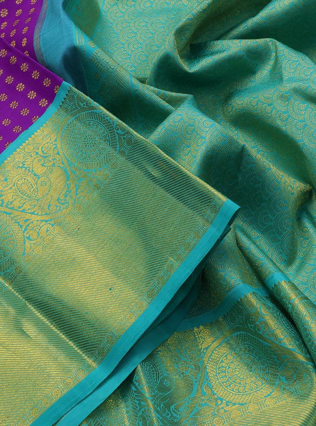 Pure kanjivaram silk saree violet and teal blue with allover zari woven butta weaves and long annam & rudhraksha zari woven border