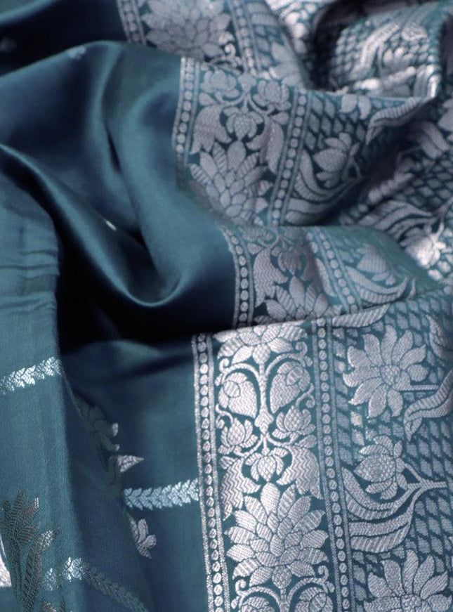 Chiniya silk saree peacoock green with silver zari woven buttas and zari woven border