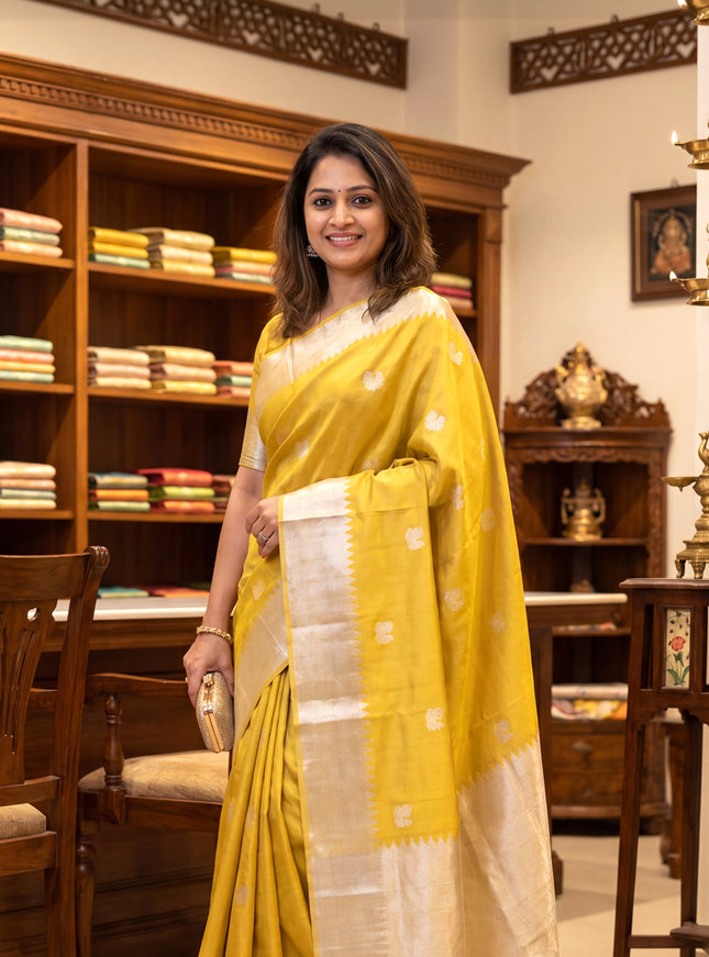 Kora kanchipuram silk saree gold with rudhraksha & annam silver zari woven buttas and long silver zari woven border