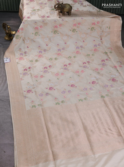Banarasi uppada silk saree beige with allover floral zari weaves and zari woven border