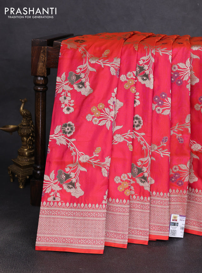 Banarasi uppada silk saree dual shade of pinkish orange with allover floral zari weaves and zari woven border