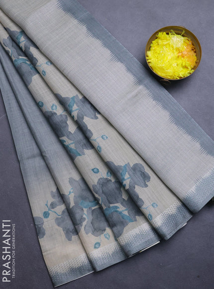 Art linen cotton saree olive green and beige with plain body and floral printed silver zari woven border