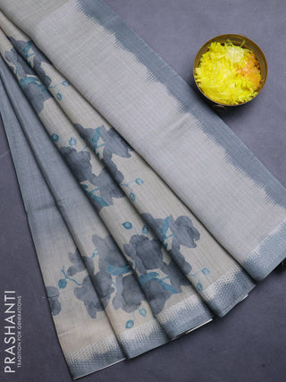 Art linen cotton saree olive green and beige with plain body and floral printed silver zari woven border