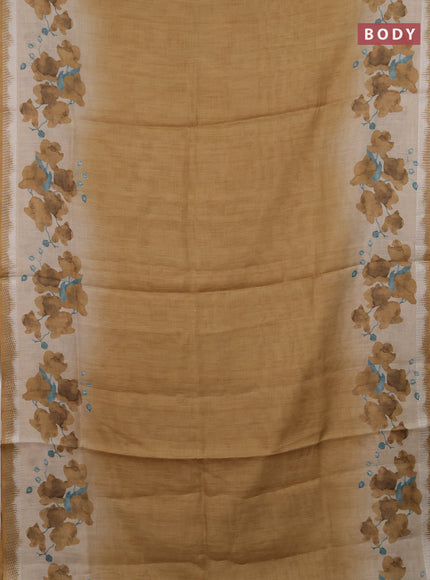 Art linen cotton saree mustard yellow and beige with plain body and floral printed silver zari woven border