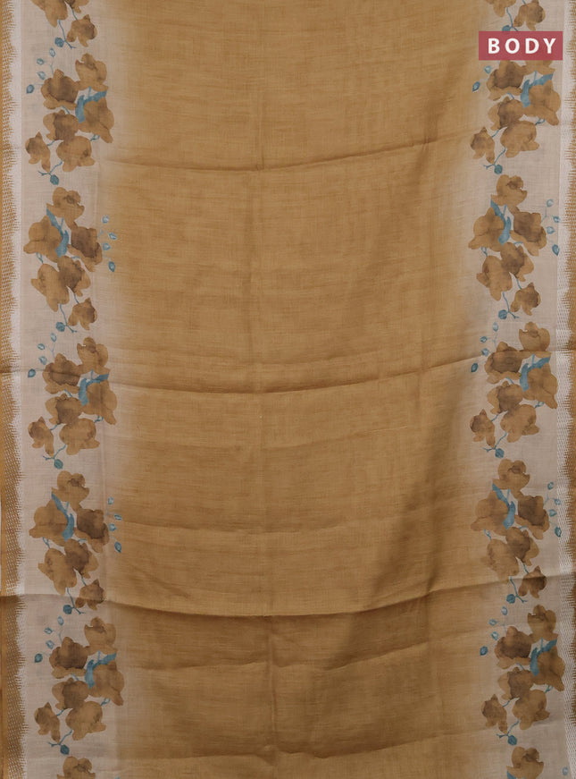 Art linen cotton saree mustard yellow and beige with plain body and floral printed silver zari woven border