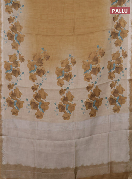 Art linen cotton saree mustard yellow and beige with plain body and floral printed silver zari woven border
