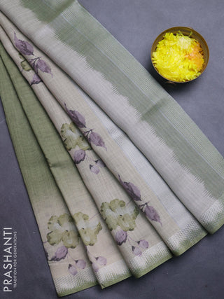 Art linen cotton saree light green and beige with plain body and floral printed silver zari woven border
