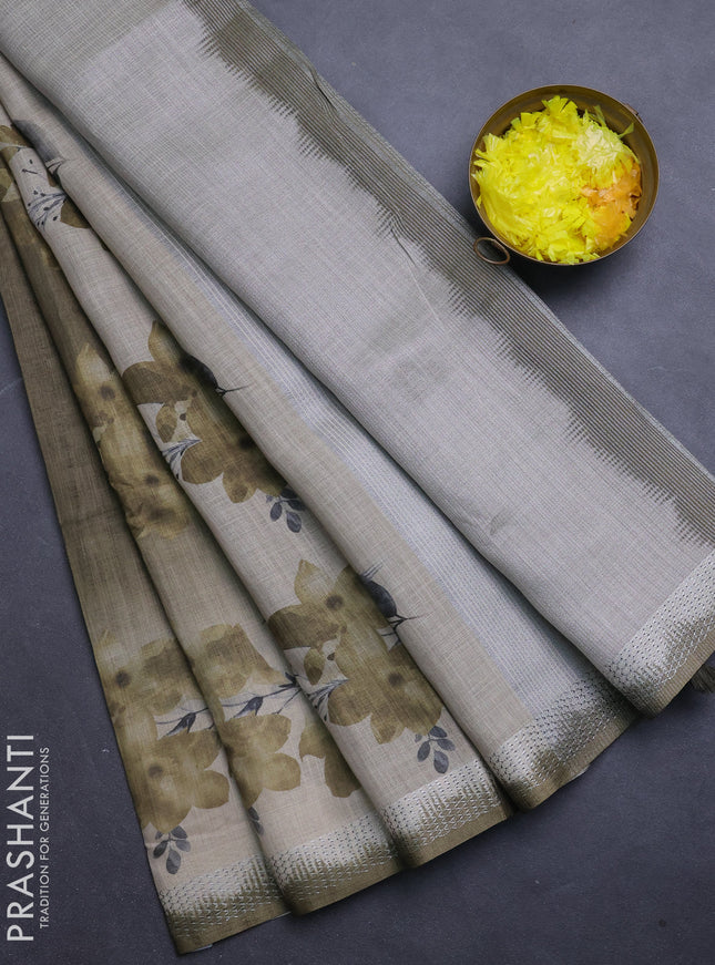 Art linen cotton saree mehendi green and beige with plain body and floral printed silver zari woven border