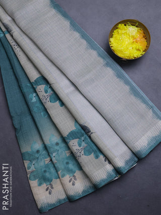 Art linen cotton saree peacock green and beige with plain body and floral printed silver zari woven border
