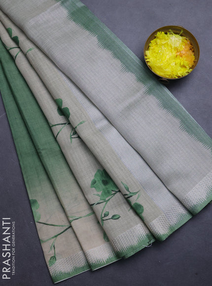 Art linen cotton saree light green and beige with plain body and floral printed silver zari woven border