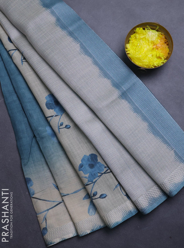 Art linen cotton saree peacock green and beige with plain body and floral printed silver zari woven border