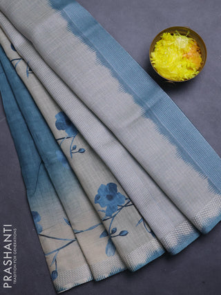 Art linen cotton saree peacock green and beige with plain body and floral printed silver zari woven border