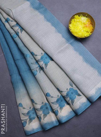 Art linen cotton saree peacock green and beige with plain body and floral printed silver zari woven border