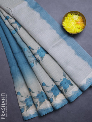 Art linen cotton saree peacock green and beige with plain body and floral printed silver zari woven border